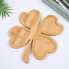 Nordic creative star moon bamboo and wood tray, home thickened four-leaf clover meal inventory, sunflower seeds and dried fruits bamboo plate Application Scenario